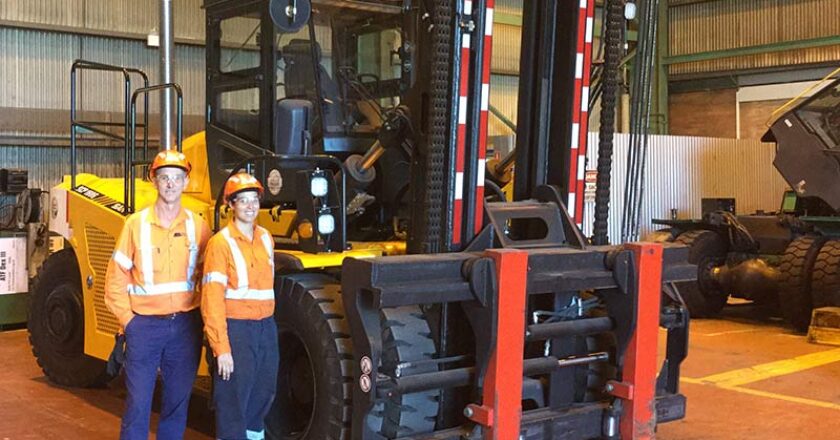 Robert Faehringer and Amy Chetcuti with their Sany SCP160C container forklift.