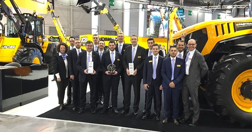 The JCB team and their freshly received trophies