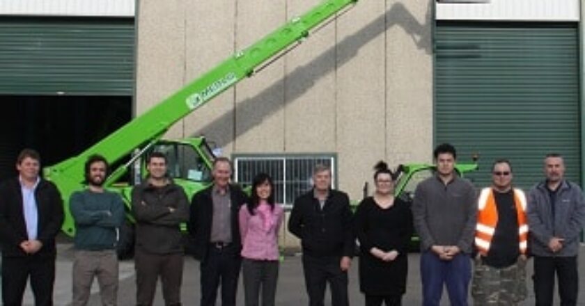 Merlo Australia General Manager Wayne Munce (pictured 6th from the left) with staff members outside Merlo's new Sydney parts warehouse.