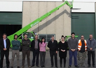 Merlo Australia General Manager Wayne Munce (pictured 6th from the left) with staff members outside Merlo's new Sydney parts warehouse.