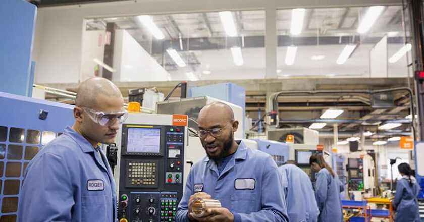 Workers in manufacturing plant