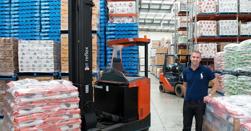 Lloyd Foods director Darren Lloyd with the company's Toyota BT Reflex RRE 200 reach forklift.