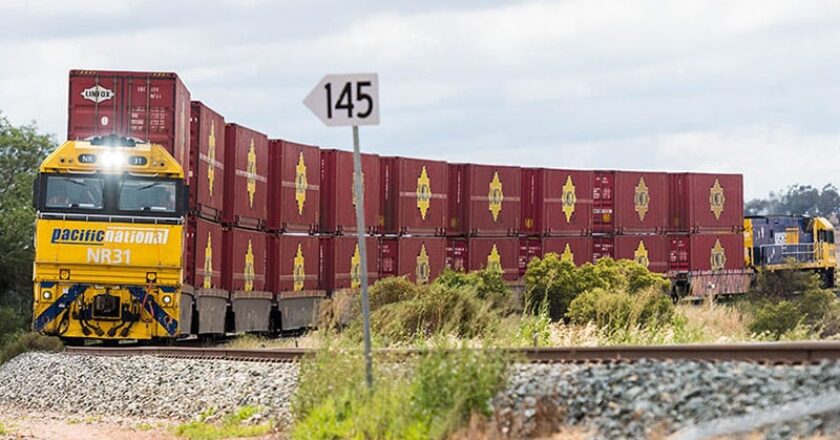 PN freight train double-stacked with Linfox boxes at Parkes