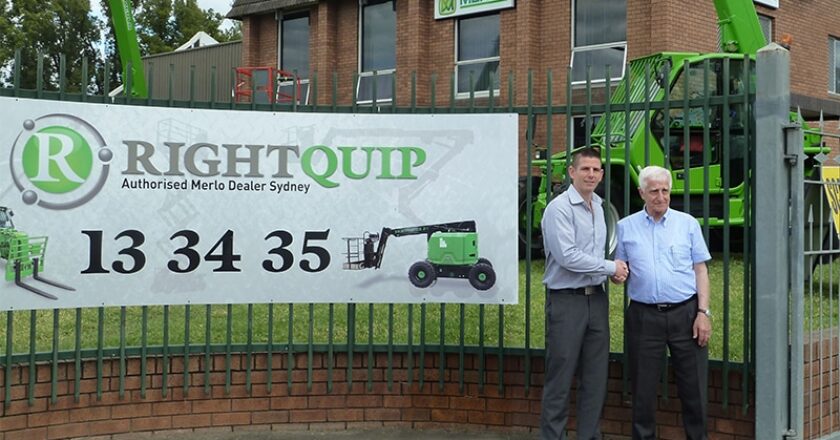 RightQuip MD Triston Smith is congratulated by Merlo President Amilcare Merlo.
