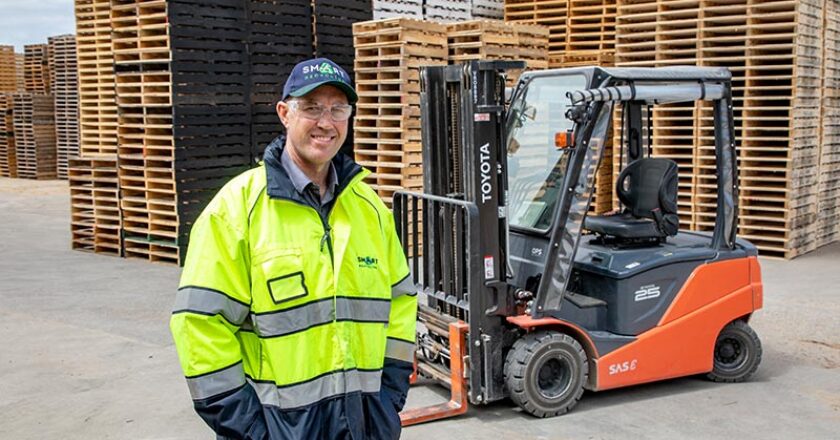 Smart Recycling Managing Director, Ward Petherbridge and one of the Toyota 8FBN 2.5-tonne electric forklifts