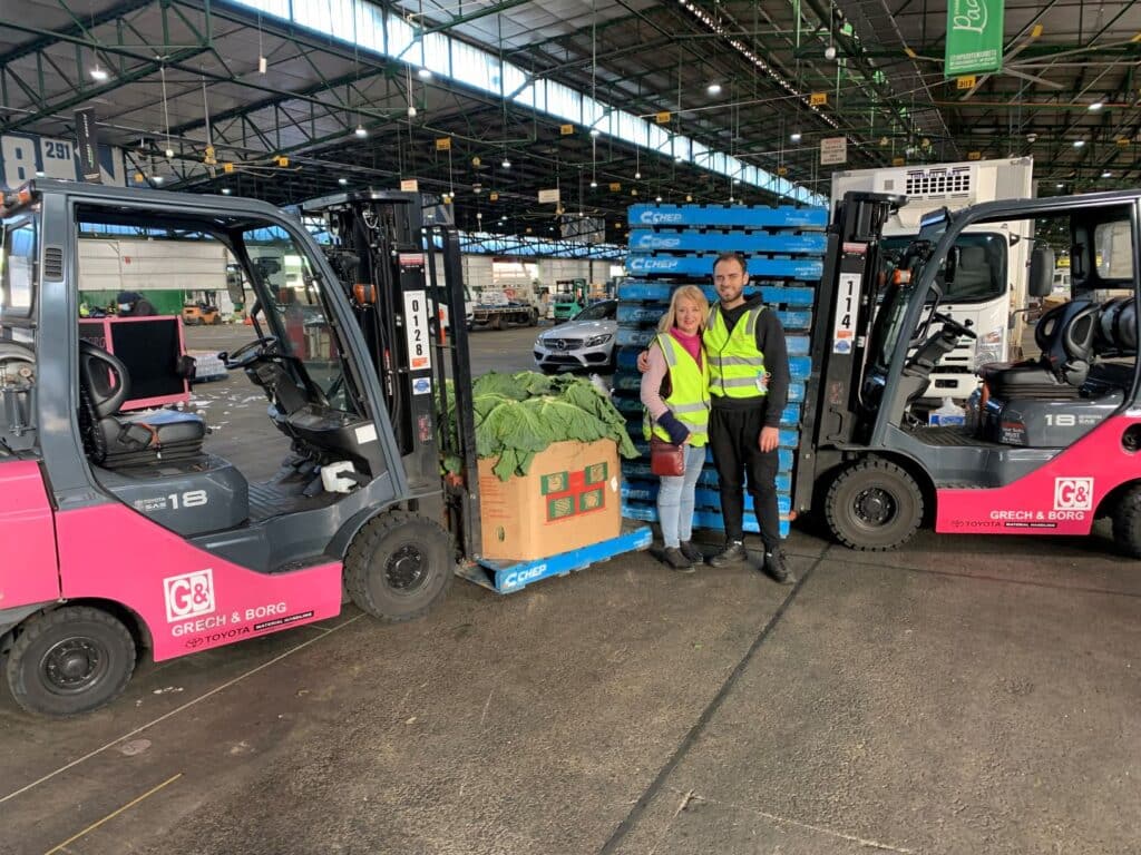 Grech & Borg managing director Joanne Stone and operations manager Brendan Stone, pictured at the Sydney Markets in June, with some of their new Toyota forklifts