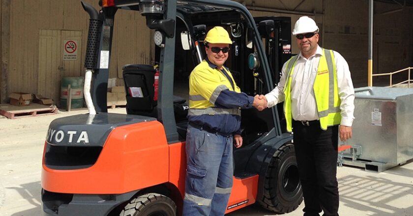 Andrew Schneider (left) and TMHA's Richard Bopping with Sibelco's highly specified new Toyota 8-FD25 forklift.