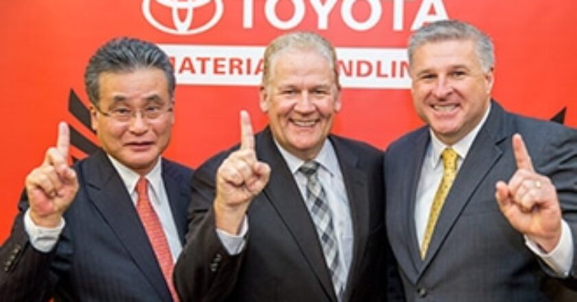 TMHA president and CEO Akihiko Nimura (left) and company EVP and COO Steve Takacs (right) present the Branch of the Year award to Perth branch manager Lance Cross (centre).