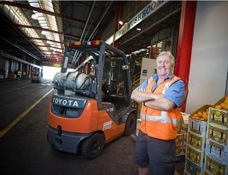 Mr Mushroom Managing Director Glenn Mews with his Toyota forklift